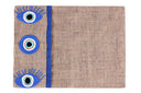"Eyes That Sparkle: Hand-Embroidered Burlap Placemat"
