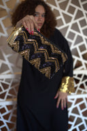Black and Gold Symphony: Hand-beaded Clutch - An Elegant Accessory that Rocks like a Classic
