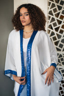 Embrace the Culture with this Kaftan Featuring the Timeless Kaf Design in Off-White