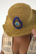 "Sunspell Hat" - Hand-Beaded Serma Eye Hat