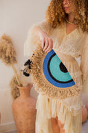 "Half-Moon Handiwork: The Hand-Braided EYE Clutch"