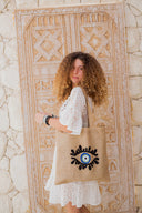 The Burlap Eye Tote Bag with a Touch of Shine