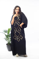 Sparkle in the Spotlight with the Hand-Beaded Abaya in black