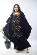 Sparkle in the Spotlight with the Hand-Beaded Abaya in black