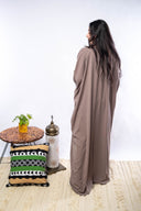 Sparkle in the Sun with the hand-beaded Galabeya V-neck in Cafe