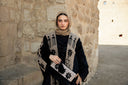 "Tales Woven in Black Velvet Kaftan"