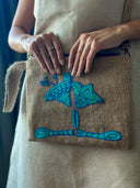 Blooming Beauty in Your Hands: The Hand-Weaved Lotus Clutch