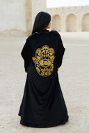 "Golden Hamsa Kaftan" in Black
