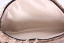 "Half-Moon Handiwork: The Hand-Braided EYE Clutch"