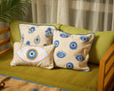 "Elevate Your Comfort: Hand Weaved KAF & Eyes Cushion in blue"