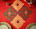 Mosaic Marvel: A Red Tablecloth with a Unique Patchwork Design