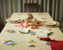 Radiant Ramadan: A Tablecloth with hand-embroidered Ramadan Kareem & Lanterns