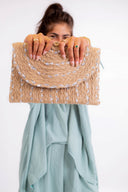 "Radiant Braided Elegance: The Envelope Clutch"