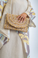 "Radiant Braided Elegance: The Envelope Clutch"