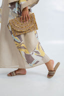 "Radiant Braided Elegance: The Envelope Clutch"