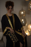 Golden Glory: The Elegant Islamic Kaftan in Black