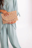 "Radiant Braided Elegance: The Envelope Clutch"