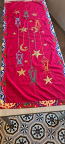 Luminous Lines: A Red Runner with Sequined Lanterns, Stars & Crescents