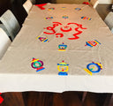 Radiant Ramadan: A Tablecloth with hand-embroidered Ramadan Kareem & Lanterns