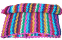 "Get Funky with a Colorful Zigzag Blanket for a Stylish Bedroom"