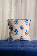 "Elevate Your Comfort: Hand Weaved KAF & Eyes Cushion in blue"